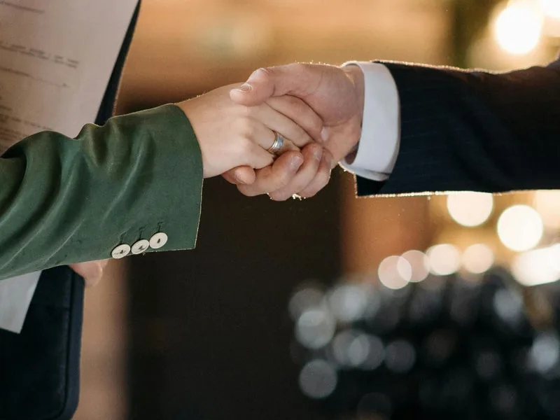 Closing a real estate transaction with a handshake